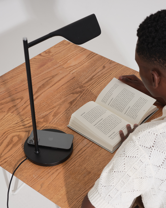 Leaf Table Lamp with Phone Charger and Man Reading